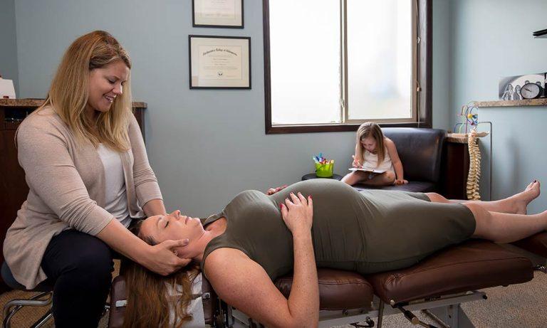 Woman Receiving Prenatal Chiropractic Care